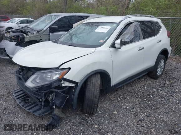 2018 Nissan Rogue SV with VIN KNMAT2MV9JP565109, listed as a IAAI auction lot 42048532 with 121,042 mi miles. Bid and sale history available at carsss.com. Image 16.