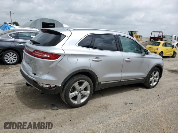 2018 Lincoln MKC Premiere z VIN 5LMCJ1C9XJUL07396, wystawiony jako Copart lot #54317485 z przebiegiem 185 589 mil mil oraz Szkoda całkowita • Salvage title. Historia ofert i sprzedaży dostępna na DreamBid. Obrazek 3.