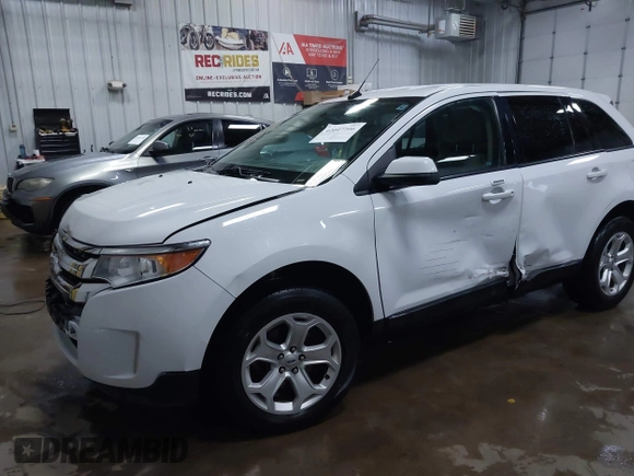 2014 Ford Edge SEL z VIN 2FMDK4JC9EBB06783, wystawiony jako IAAI lot #42047206 z przebiegiem 125 963 mil mil oraz . Historia ofert i sprzedaży dostępna na DreamBid. Obrazek 18.