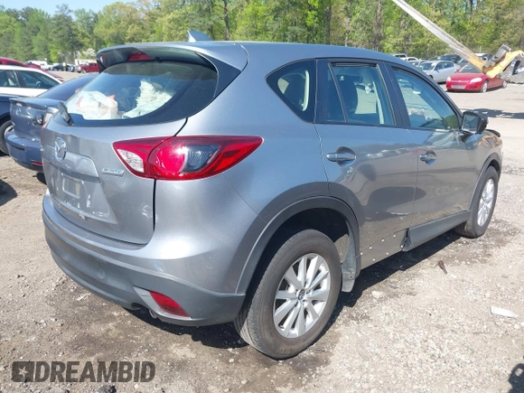 2013 Mazda CX-5 Sport z VIN JM3KE2BE9D0132928, wystawiony jako IAAI lot #41997589 z przebiegiem Nie podano mil oraz . Historia ofert i sprzedaży dostępna na DreamBid. Obrazek 4.