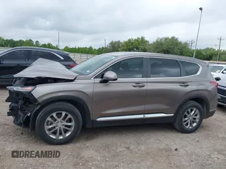 2019 Hyundai Santa Fe SE z VIN 5NMS23AD2KH014037, wystawiony jako IAAI lot #42110778 z przebiegiem 48 975 mil mil oraz . Historia ofert i sprzedaży dostępna na DreamBid. Obrazek 15.