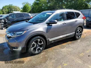 2018 Honda CR-V Touring with VIN 7FARW1H96JE048818, listed as a Copart auction lot 52157625 with 77,480 mi miles and Salvage title. Bid and sale history available at DreamBid. Image 1.