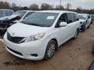 2012 Toyota Sienna LE with VIN 5TDJK3DC3CS048579, listed as a IAAI auction lot 41055074 with 202,791 mi miles. Bid and sale history available at carsss.com. Image 2.