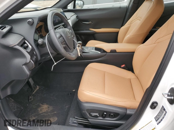 2023 Lexus UX 250h Premium z VIN JTHP6JBH1P2145423, wystawiony jako Copart lot #47424085 z przebiegiem 8 883 mil mil oraz Czysty tytuł • Clean title. Historia ofert i sprzedaży dostępna na DreamBid. Obrazek 7.