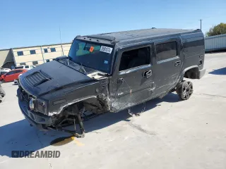 2005 Hummer H2 SUV with VIN 5GRGN23U95H101796, listed as a Copart auction lot 76991574 with 88,204 mi miles and Salvage Title. Bid and sale history available at carsss.com. Image 1.