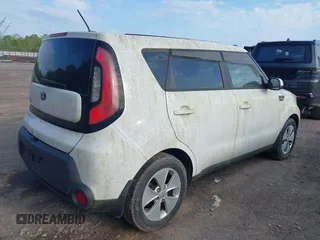 2014 Kia Soul with VIN KNDJN2A20E7011516, listed as a IAAI auction lot 42101150 with 118,288 mi miles. Bid and sale history available at carsss.com. Image 4.
