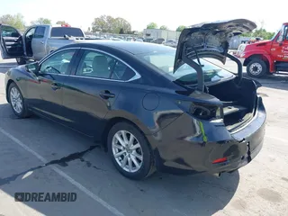 2016 Mazda Mazda6 i Sport with VIN JM1GJ1U54G1422560, listed as a IAAI auction lot 41935881 with 87,030 mi miles. Bid and sale history available at carsss.com. Image 3.