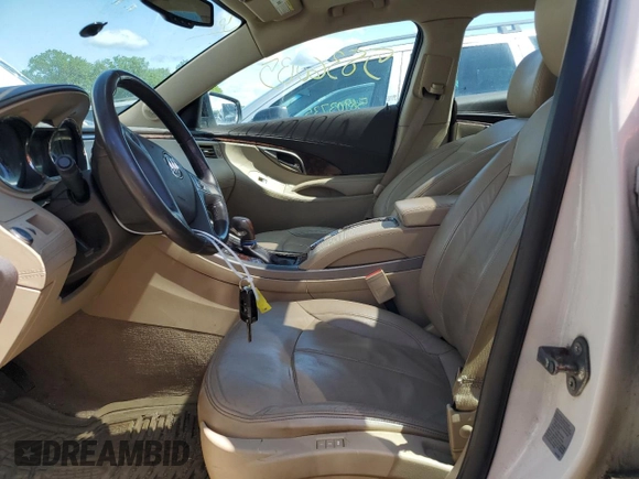 2012 Buick LaCrosse Premium 1 z VIN 1G4GD5E33CF158512, wystawiony jako Copart lot #58360135 z przebiegiem 215 782 mil mil oraz Szkoda całkowita • Salvage title. Historia ofert i sprzedaży dostępna na DreamBid. Obrazek 7.