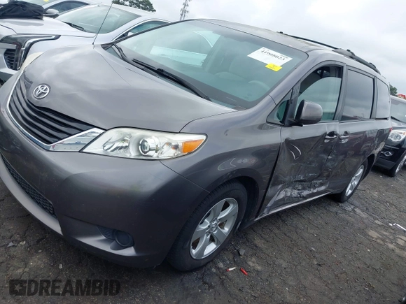 2014 Toyota Sienna LE AAS with VIN 5TDKK3DC3ES506466, listed as a IAAI auction lot 41908023 with 118,297 mi miles and . Bid and sale history available at carsss.com. Image 17.