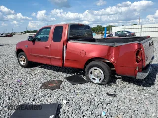 2000 Ford F-150 XL with VIN 1FTRX17W3YNB80866, listed as a Copart auction lot 61151005 with Not provided miles and Salvage title. Bid and sale history available at DreamBid. Image 2.