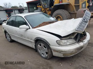 2001 Cadillac Catera z VIN W06VR54R31R002275, wystawiony jako IAAI lot #41328461 z przebiegiem 140 400 mil mil oraz . Historia ofert i sprzedaży dostępna na DreamBid. Obrazek 1.