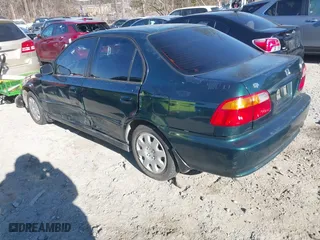 1999 Honda Civic VP with VIN 2HGEJ6616XH515145, listed as a IAAI auction lot 41299003 with 209,375 mi miles. Bid and sale history available at carsss.com. Image 3.