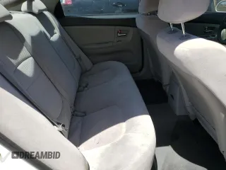 2008 Kia Spectra EX z VIN KNAFE121685506287, wystawiony jako Copart lot #58065295 z przebiegiem 181 686 mil mil oraz Szkoda całkowita • Salvage title. Historia ofert i sprzedaży dostępna na DreamBid. Obrazek 10.