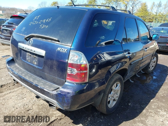 2004 Acura MDX Touring Pkg with VIN 2HNYD186X4H515704, listed as a IAAI auction lot 41851825 with 999,999 mi miles. Bid and sale history available at carsss.com. Image 4.