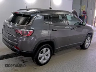 2020 Jeep Compass Latitude with VIN 3C4NJDBB8LT214802, listed as a IAAI auction lot 42088293 with 89,389 mi miles. Bid and sale history available at carsss.com. Image 1.