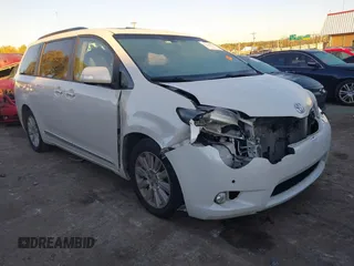 2016 Toyota Sienna XLE with VIN 5TDYK3DC9GS759983, listed as a IAAI auction lot 40859938 with 120,066 mi miles. Bid and sale history available at carsss.com. Image 1.