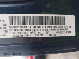 2014 Dodge Journey SXT with VIN 3C4PDCBB4ET245932, listed as a IAAI auction lot 41857444 with 228,827 mi miles. Bid and sale history available at carsss.com. Image 9.