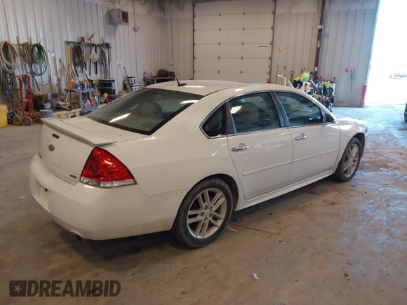 2015 Chevrolet Impala LTZ with VIN 2G1WC5E3XF1152424, listed as a IAAI auction lot 42222423 with 94,475 mi miles and . Bid and sale history available at DreamBid. Image 4.