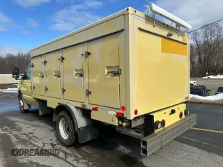 2021 Ford Econoline Cargo with VIN 1FDXE4FN1MDC34409, listed as a Copart auction lot 48386205 with 99,008 mi miles and Clean Title. Bid and sale history available at DreamBid. Image 2.
