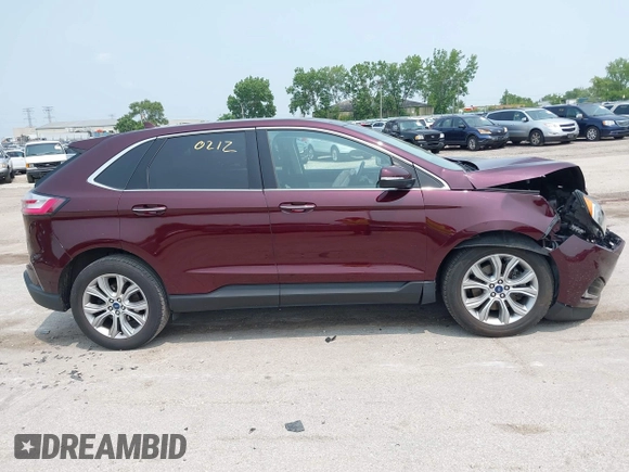 2019 Ford Edge Titanium with VIN 2FMPK4K96KBB20247, listed as a IAAI auction lot 42450212 with 121,756 mi miles and . Bid and sale history available at DreamBid. Image 13.