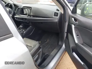 2016 Mazda CX-5 Grand Touring with VIN JM3KE4DY1G0616714, listed as a IAAI auction lot 41459781 with 90,763 mi miles. Bid and sale history available at carsss.com. Image 5.
