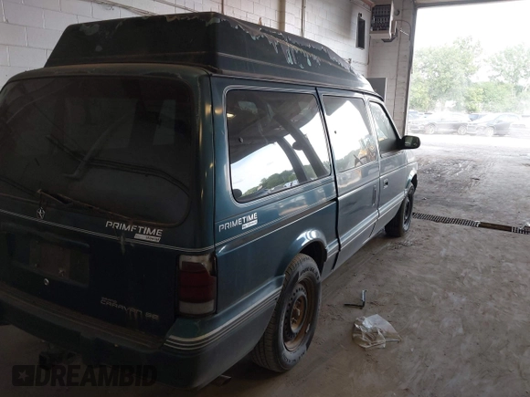 1995 Dodge Caravan Grand SE with VIN 1B4GH44R3SX566801, listed as a IAAI auction lot 42699597 with 103,069 mi miles and . Bid and sale history available at DreamBid. Image 6.