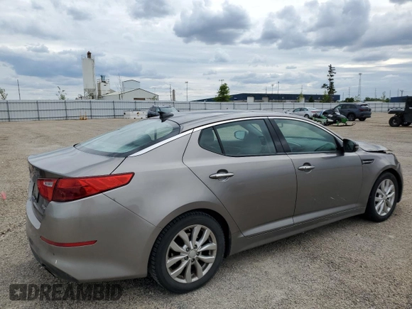 2015 Kia Optima EX with VIN 5XXGN4A75FG456554, listed as a Copart auction lot 58704005 with 114,146 mi miles and Salvage title. Bid and sale history available at DreamBid. Image 3.