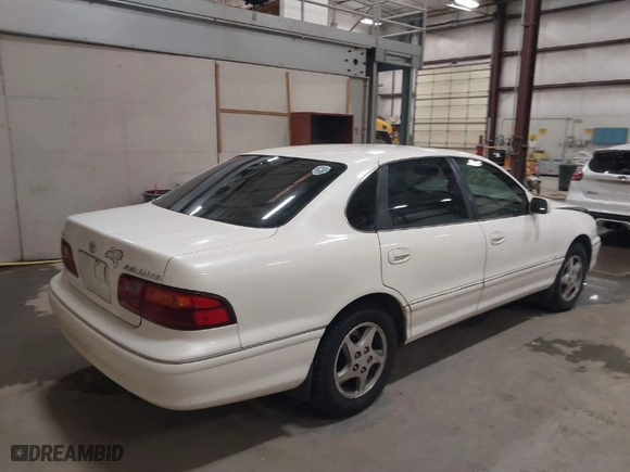 1999 Toyota Avalon XL with VIN 4T1BF18B2XU293904, listed as a IAAI auction lot 41645137 with NaN miles. Bid and sale history available at carsss.com. Image 4.