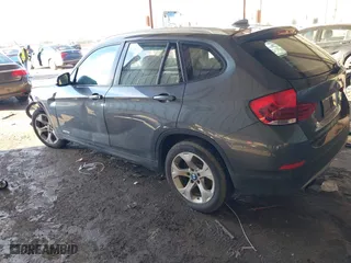 2013 BMW X1 28i with VIN WBAVM1C53DVW43228, listed as a IAAI auction lot 41301776 with 61,323 mi miles. Bid and sale history available at carsss.com. Image 3.