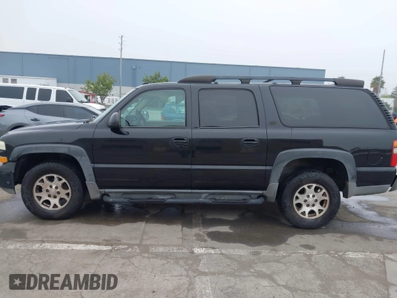 2002 Chevrolet Suburban Z71 with VIN 3GNFK16T12G354322, listed as a IAAI auction lot 41646865 with 229,700 mi miles. Bid and sale history available at carsss.com. Image 14.