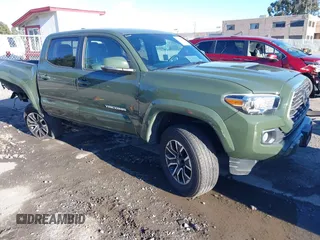 2021 Toyota Tacoma SR with VIN 3TMCZ5AN7MM395940, listed as a IAAI auction lot 41240832 with 39,338 mi miles and . Bid and sale history available at DreamBid. Image 1.