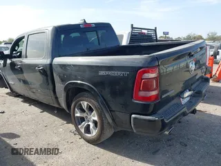 2021 Ram 1500 Laramie z VIN 1C6SRFJT4MN799792, wystawiony jako IAAI lot #41838329 z przebiegiem 106 968 mil mil oraz . Historia ofert i sprzedaży dostępna na DreamBid. Obrazek 3.