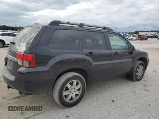 2010 Mitsubishi Endeavor LS with VIN 4A4JM2AS0AE011338, listed as a Copart auction lot 83211414 with 104,582 mi miles and Salvage Title. Bid and sale history available at carsss.com. Image 3.