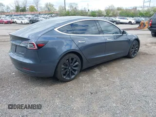 2020 Tesla Model 3 Long Range with VIN 5YJ3E1EB2LF646449, listed as a IAAI auction lot 42059086 with 120,981 mi miles and . Bid and sale history available at DreamBid. Image 4.