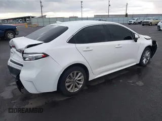2023 Toyota Corolla Hybrid LE with VIN JTDBCMFE8PJ010659, listed as a IAAI auction lot 41772192 with 33,644 mi miles. Bid and sale history available at carsss.com. Image 4.