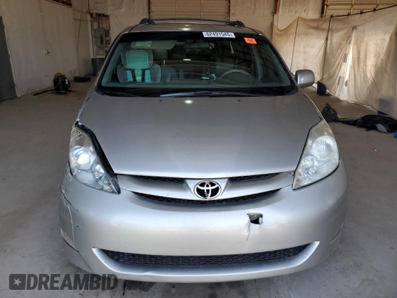 2010 Toyota Sienna XLE with VIN 5TDYK4CCXAS323450, listed as a Copart auction lot 62491545 with 220,121 mi miles and Salvage title. Bid and sale history available at DreamBid. Image 5.