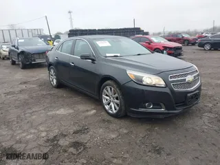 2013 Chevrolet Malibu LTZ with VIN 1G11H5SA7DF177897, listed as a IAAI auction lot 41984307 with 265,840 mi miles. Bid and sale history available at carsss.com. Image 1.