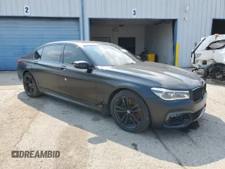 2018 BMW 7 Series ALPINA B7 xDrive with VIN WBA7F2C52JB238192, listed as a Copart auction lot 57851425 with 69,444 mi miles and Salvage title. Bid and sale history available at DreamBid. Image 4.