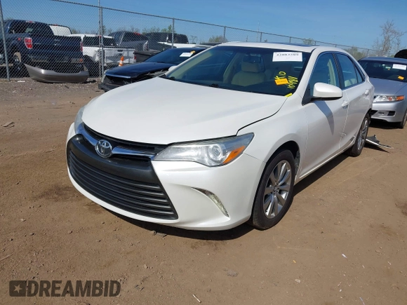 2015 Toyota Camry XLE with VIN 4T1BF1FK1FU977554, listed as a IAAI auction lot 42083589 with 104,811 mi miles and . Bid and sale history available at DreamBid. Image 18.