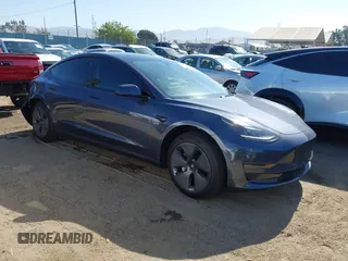 2023 Tesla Model 3 z VIN 5YJ3E1EA3PF412267, wystawiony jako IAAI lot #42276306 z przebiegiem 23 360 mil mil oraz . Historia ofert i sprzedaży dostępna na DreamBid. Obrazek 1.