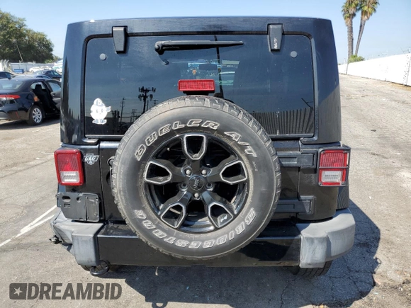 2018 Jeep Wrangler JK Unlimited Altitude with VIN 1C4BJWEG5JL820816, listed as a Copart auction lot 71212614 with 76,630 mi miles and Salvage Title. Bid and sale history available at carsss.com. Image 6.