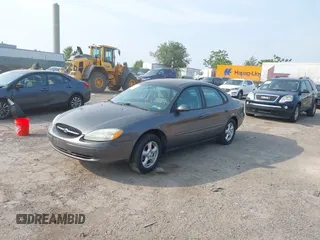 2003 Ford Taurus SE Standard with VIN 1FAFP53203G173180, listed as a IAAI auction lot 42495369 with 129,091 mi miles and . Bid and sale history available at DreamBid. Image 2.