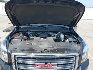 2016 GMC Yukon XL SLE with VIN 1GKS1FKC9GR161876, listed as a IAAI auction lot 39948106 with 60,800 mi miles. Bid and sale history available at carsss.com. Image 10.