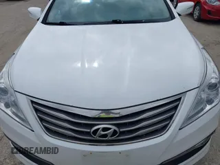 2016 Hyundai Azera Limited z VIN KMHFH4JG6GA547389, wystawiony jako IAAI lot #42374403 z przebiegiem 164 843 mil mil oraz . Historia ofert i sprzedaży dostępna na DreamBid. Obrazek 6.