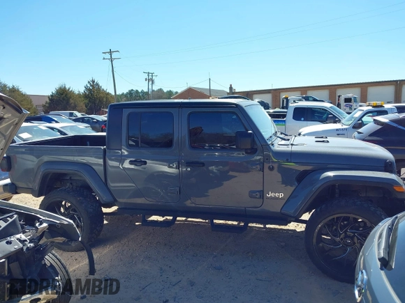 2020 Jeep Gladiator Overland z VIN 1C6HJTFG4LL143369, wystawiony jako IAAI lot #41827409 z przebiegiem 77 752 mil mil oraz . Historia ofert i sprzedaży dostępna na DreamBid. Obrazek 13.