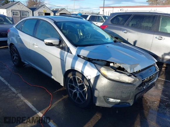 2017 Ford Focus SEL with VIN 1FADP3H21HL336597, listed as a IAAI auction lot 41729173 with 166,140 mi miles. Bid and sale history available at carsss.com. Image 1.