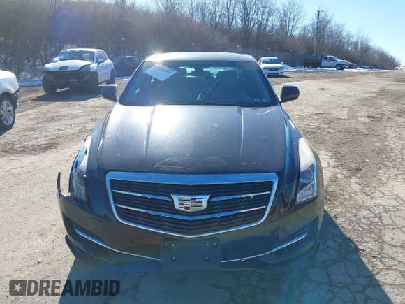 2016 Cadillac ATS Standard AWD z VIN 1G6AG5RX5G0103585, wystawiony jako IAAI lot #41439995 z przebiegiem 58 615 mil mil oraz . Historia ofert i sprzedaży dostępna na DreamBid. Obrazek 13.