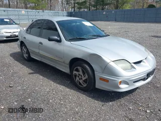 2002 Pontiac Sunfire SE z VIN 1G2JB524227481573, wystawiony jako IAAI lot #41917718 z przebiegiem 208 991 mil mil oraz . Historia ofert i sprzedaży dostępna na DreamBid. Obrazek 1.