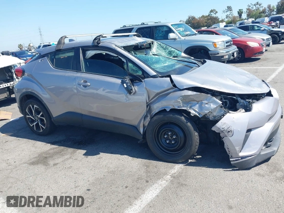 2019 Toyota C-HR XLE with VIN JTNKHMBX8K1046347, listed as a IAAI auction lot 42140743 with 49,918 mi miles and . Bid and sale history available at DreamBid. Image 12.