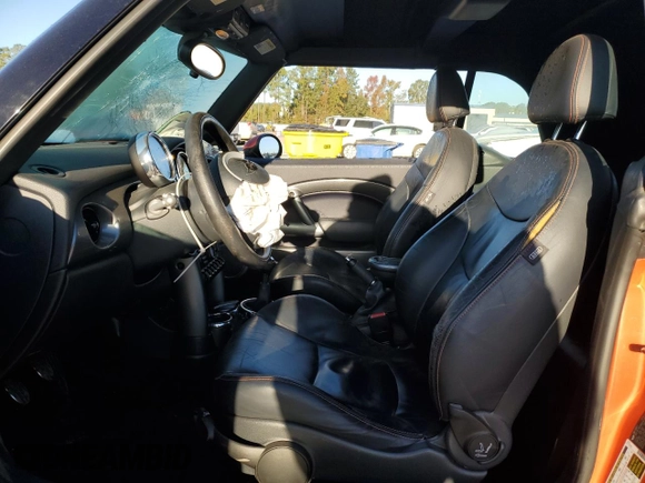 2007 MINI Convertible S with VIN WMWRH33587TJ43499, listed as a Copart auction lot 76266684 with 103,691 mi miles and Salvage title. Bid and sale history available at DreamBid. Image 7.